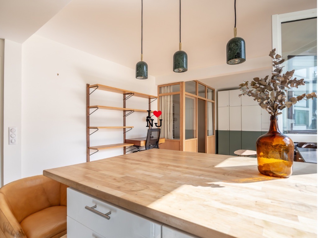 Salon lumineux T2 39m2 rue Marcadet Paris 18e - Nicolas Jeffs